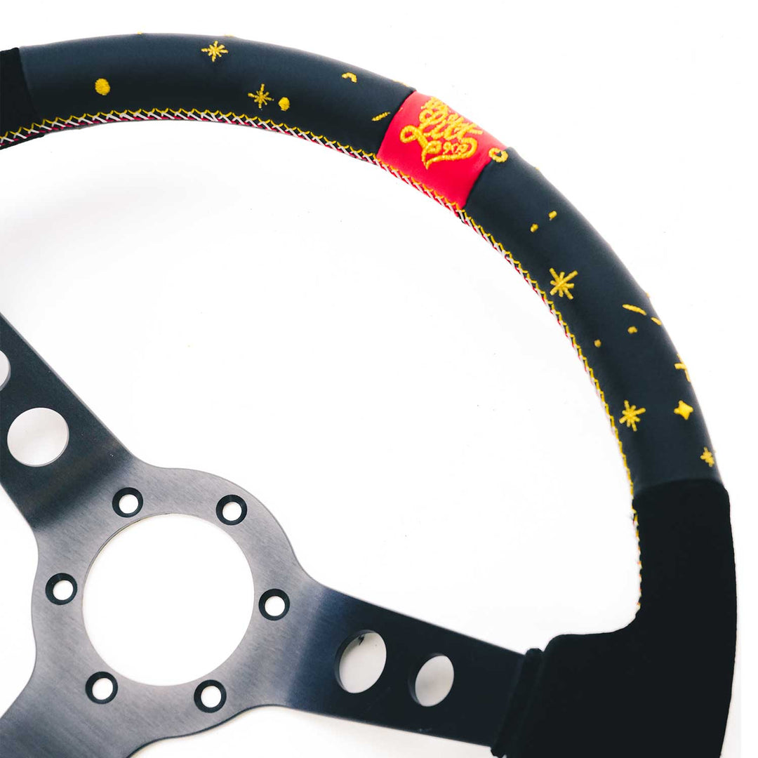 COLLABORATION STEERING WHEEL RYAN LITTERAL
